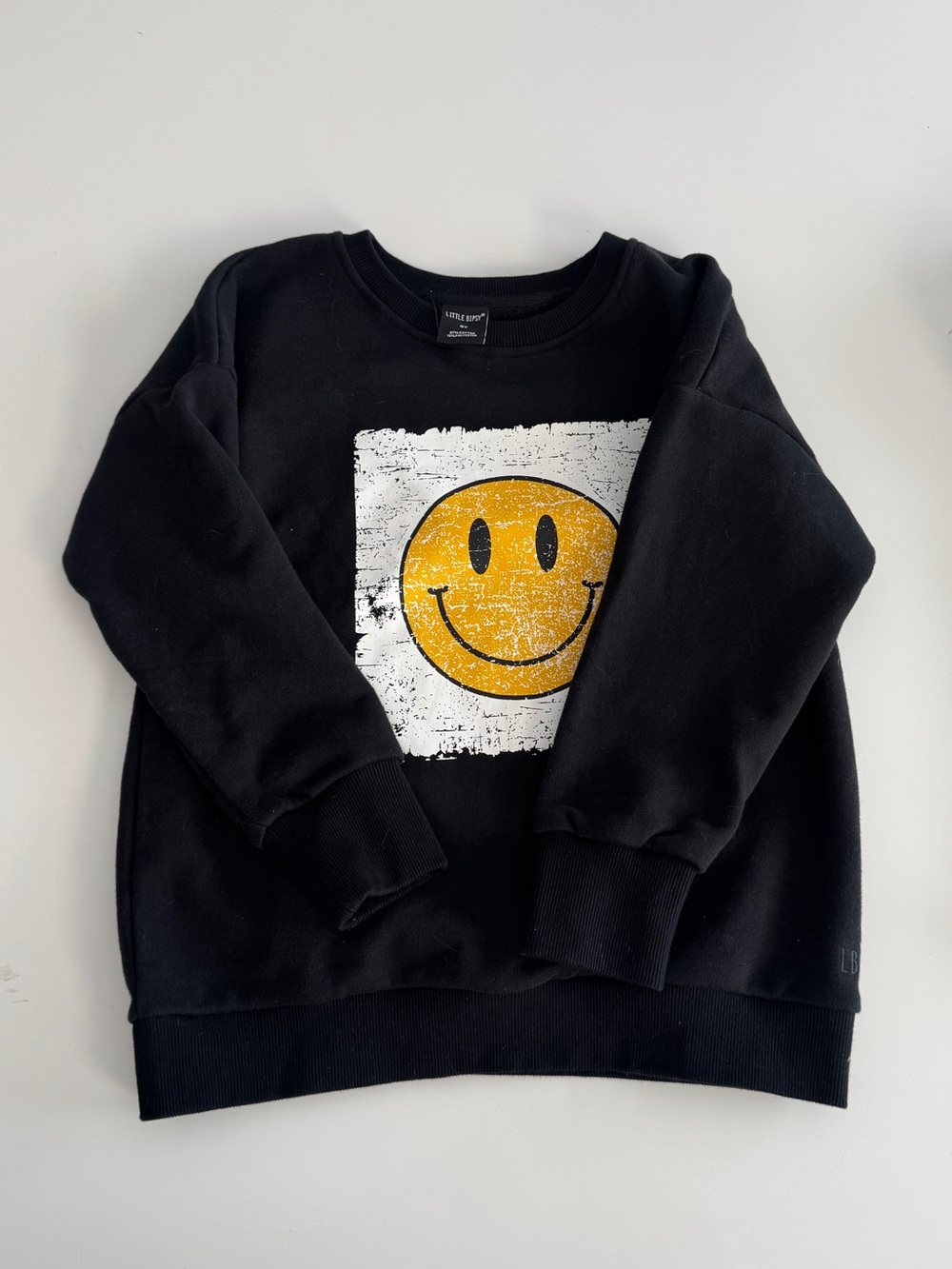 Little Bipsy Black Sweatshirt with Yellow Smiley Graphic